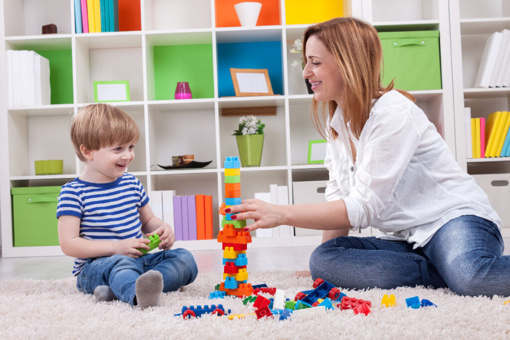 Happy family playing with toys