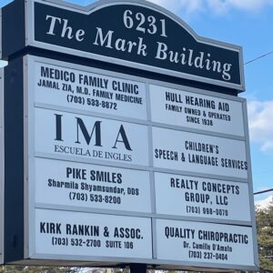 Exterior directory sign for The Mark Building at 6231 in Falls Church, VA, showing the location of several healthcare and professional offices near Good Beginnings Therapy.