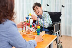 pediatric therapist with a kid pediatric therapist with a kid.png